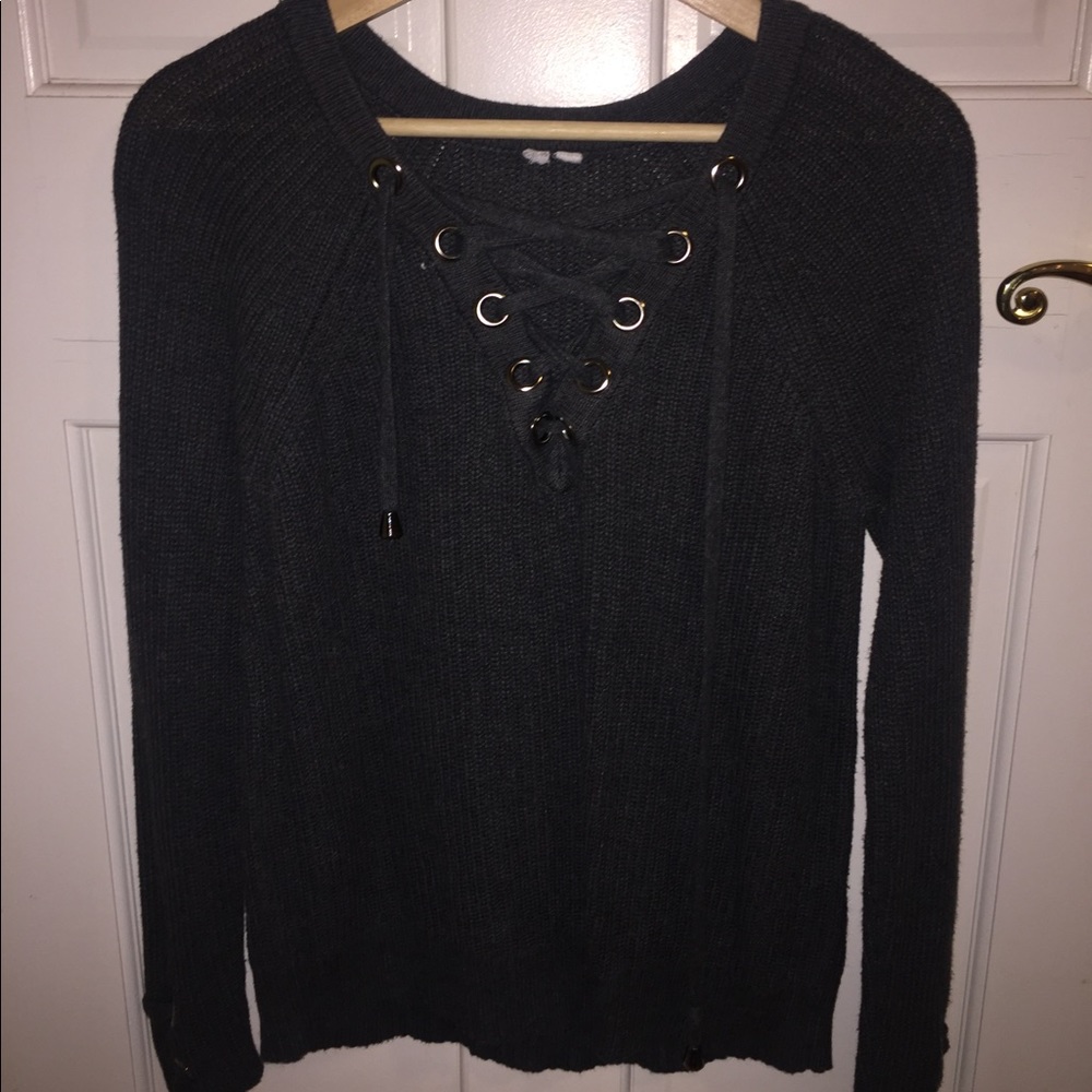 Woman’s grey sweater